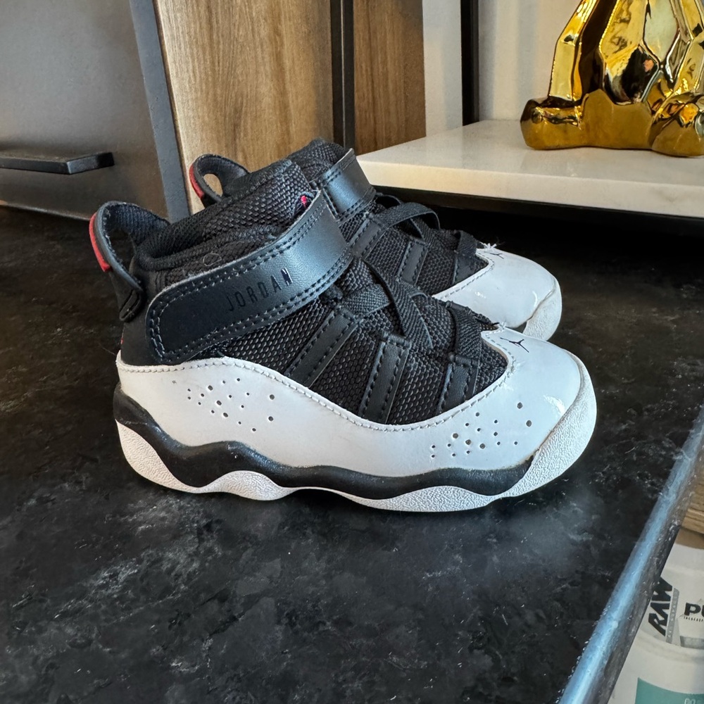 Jordan Kids Black and White High-Top Sneakers